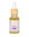 Scentral Zone 0.5 fl oz Velvet Face Serum, a yellow rejuvenating serum with cucumber and seaweed, in a glass dropper bottle with a wooden collar and white dropper top.