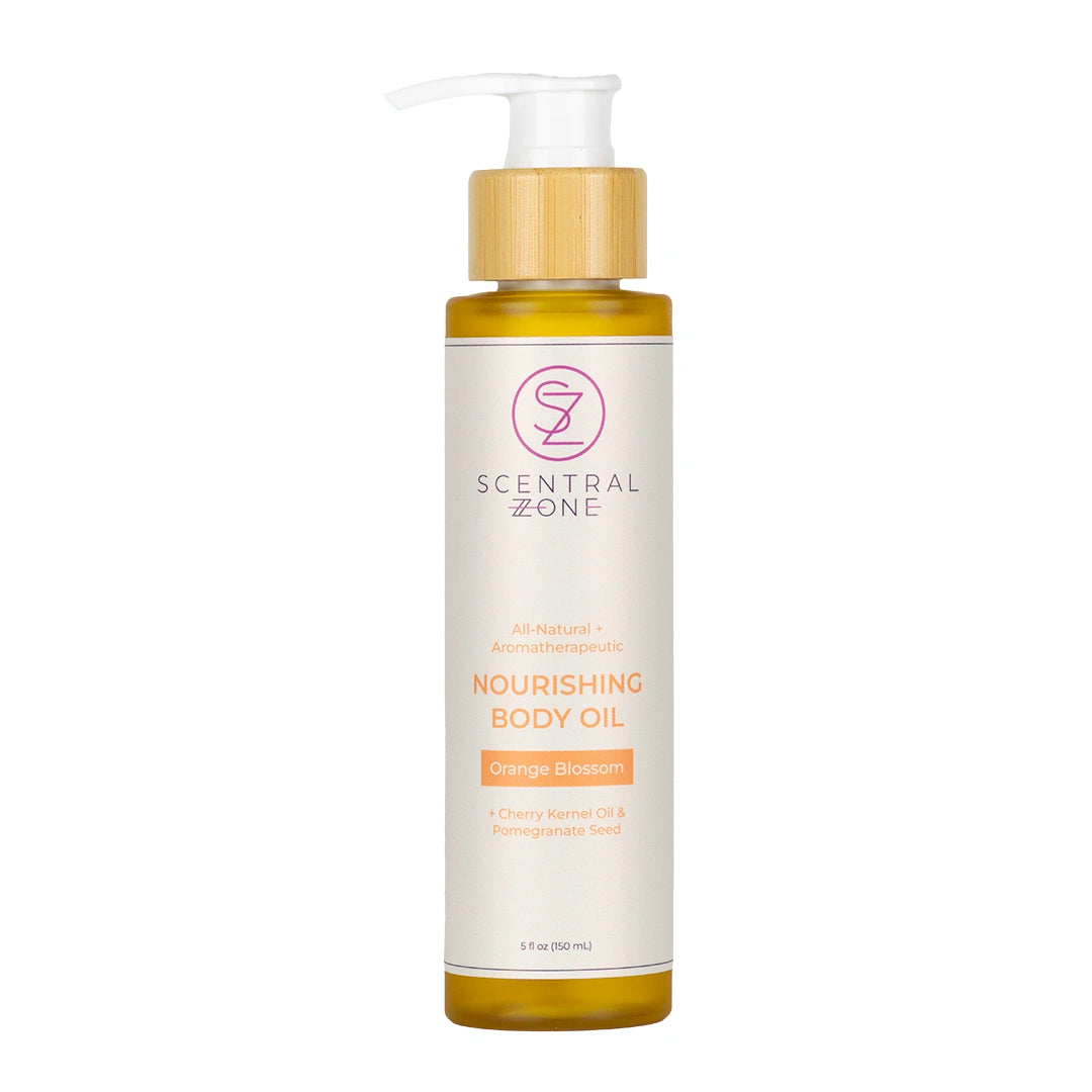 Scental Zone 5oz Nourishing Body Oil in Orange Blossom Scent in a white bottle with a bamboo pump color with a white background. 