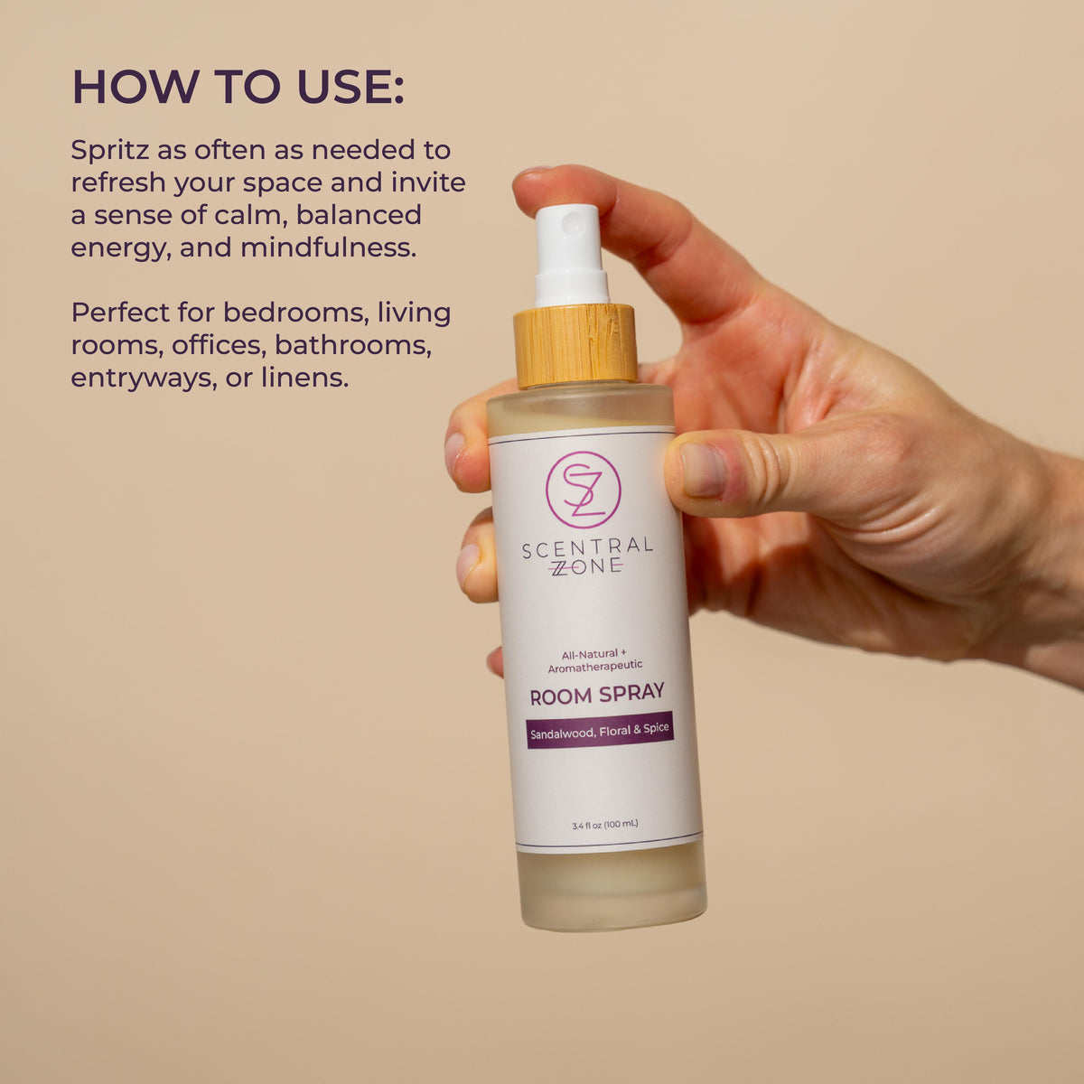 A hand holding Scentral Zone Room Spray in scent Scandalwood, Floral, and Spice in a clear bottle with a bamboo pump collar. Text is displayed next to the bottle explaining how to use the product.