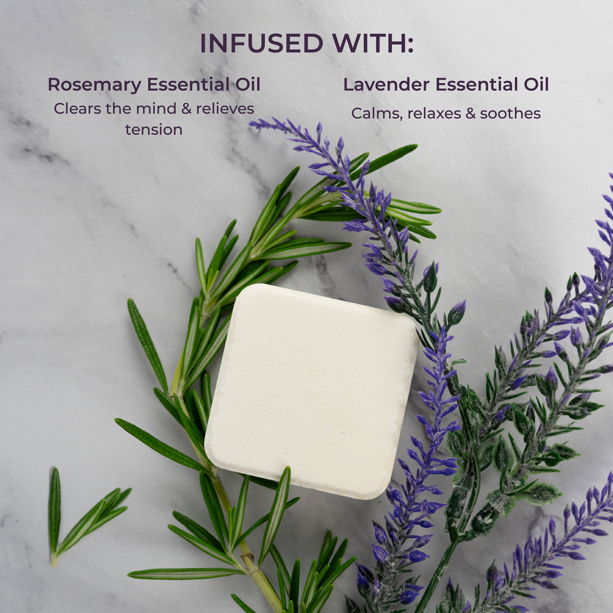 Image of Scentral Zone square Shower Steamer laid next to fresh rosemary and lavender representing the essential oil infusions in the product.