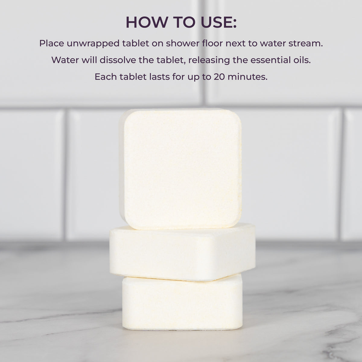 Image of 3 Scentral Zone Shower Steamer capsules stacked on top of each other with a white backsplash background. Text is displayed above explaining directions on how to use the shower steamers.